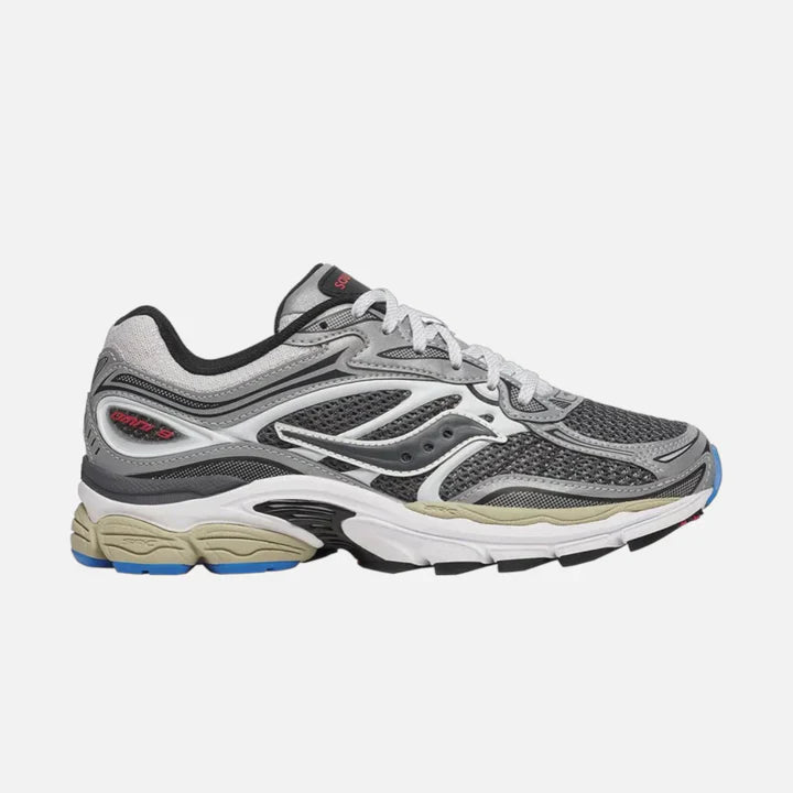 Gray running shoe with white sole on a light gray background